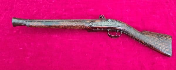 A Balkan or Turkish flintlock Blunderbuss with decoration to the woodwork. Circa 1800. Ref 3251